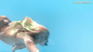 Submerged submissive succumbs to Lisi Kitty's underwater erotic exploitation and ravaging