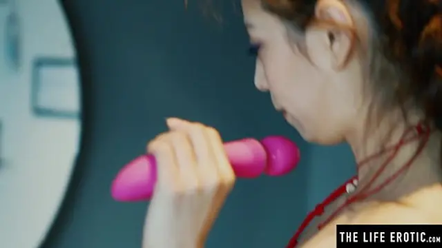 Hot Asian girl shoots in glass and sips every drop