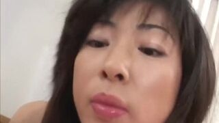 Naasty Asian Cougar Whips Out Those Tantalizing Titties For a Sinful Satisfier