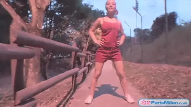 Hot teen wiggles her large boobs in the streets