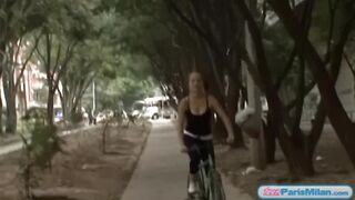 Busty solo teen riding her bike through the park