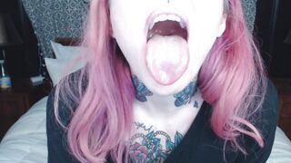 pink haired girl holds mouth wide open for you ;)