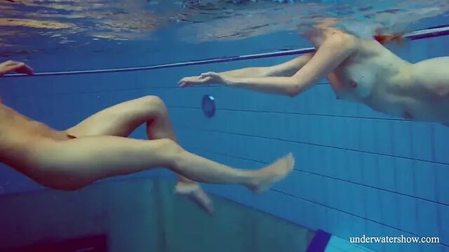 Blonde and Brunette babes swim naked